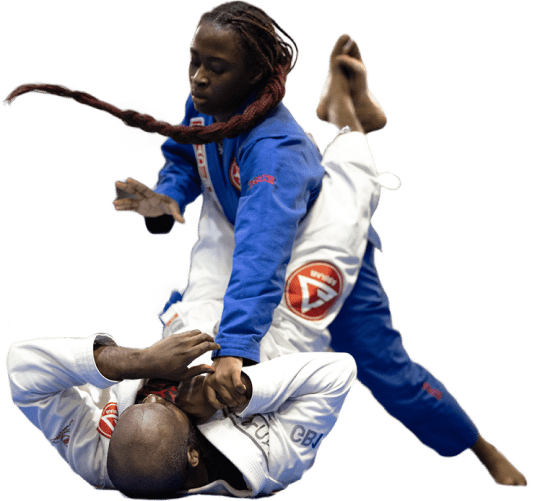 Students practicing Brazilian Jiu-Jitsu techniques in a Montreal training class